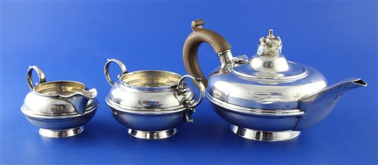 A George V three piece bachelors silver tea set, gross 17 oz.